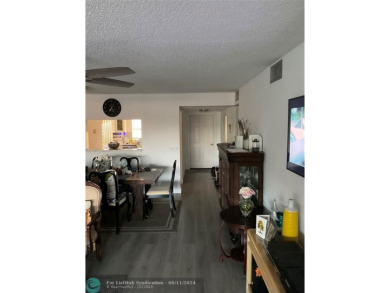 WELL KEPT CONDO WITH UPGRADED KITCHEN WITH QUARTZ COUNTERTOPS on Sunrise Lakes Phase III in Florida - for sale on GolfHomes.com, golf home, golf lot