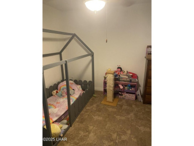 This home has been updated with a new heat pump AC conditioner on London Bridge Golf Course in Arizona - for sale on GolfHomes.com, golf home, golf lot
