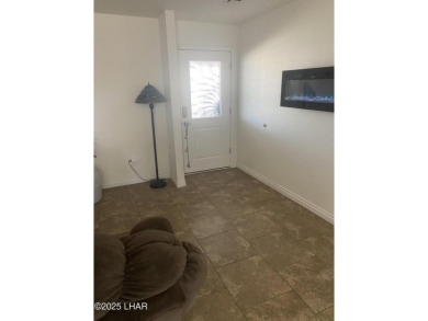 This home has been updated with a new heat pump AC conditioner on London Bridge Golf Course in Arizona - for sale on GolfHomes.com, golf home, golf lot