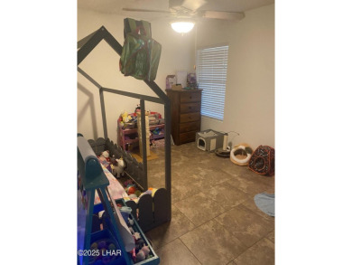 This home has been updated with a new heat pump AC conditioner on London Bridge Golf Course in Arizona - for sale on GolfHomes.com, golf home, golf lot
