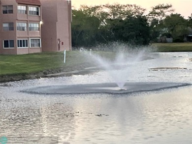 WELL KEPT CONDO WITH UPGRADED KITCHEN WITH QUARTZ COUNTERTOPS on Sunrise Lakes Phase III in Florida - for sale on GolfHomes.com, golf home, golf lot