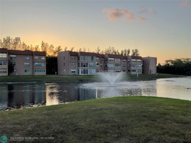 WELL KEPT CONDO WITH UPGRADED KITCHEN WITH QUARTZ COUNTERTOPS on Sunrise Lakes Phase III in Florida - for sale on GolfHomes.com, golf home, golf lot