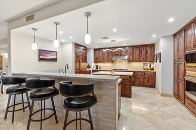 Sweeping fairway, mountain, and city-light views fill every room on Kierland Golf Club in Arizona - for sale on GolfHomes.com, golf home, golf lot