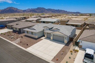 Experience luxury desert living in this stunning 4-bedroom on Las Barrancas Golf Course in Arizona - for sale on GolfHomes.com, golf home, golf lot