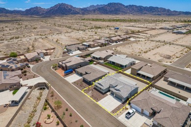 Experience luxury desert living in this stunning 4-bedroom on Las Barrancas Golf Course in Arizona - for sale on GolfHomes.com, golf home, golf lot