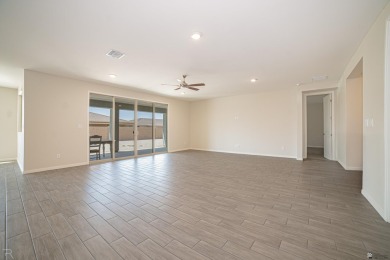 Experience luxury desert living in this stunning 4-bedroom on Las Barrancas Golf Course in Arizona - for sale on GolfHomes.com, golf home, golf lot