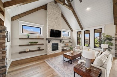 Welcome to this exceptional reverse 1.5-story walkout home in on Fred Arbanas Golf Course At Longview Lakes - Longview Lake in Missouri - for sale on GolfHomes.com, golf home, golf lot