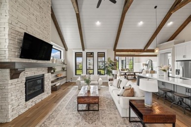 Welcome to this exceptional reverse 1.5-story walkout home in on Fred Arbanas Golf Course At Longview Lakes - Longview Lake in Missouri - for sale on GolfHomes.com, golf home, golf lot