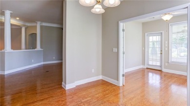 Charming ranch home with stunning golf course views! This on Hampton Golf Village in Georgia - for sale on GolfHomes.com, golf home, golf lot