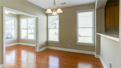 Charming ranch home with stunning golf course views! This on Hampton Golf Village in Georgia - for sale on GolfHomes.com, golf home, golf lot