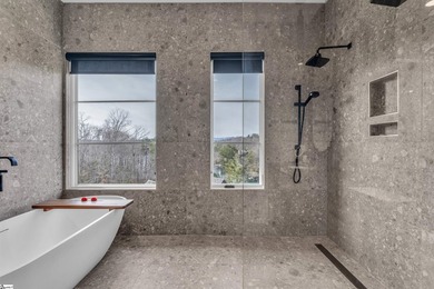 Lake & mountain views set the tone for this exceptional newly on The Reserve At Lake Keowee in South Carolina - for sale on GolfHomes.com, golf home, golf lot