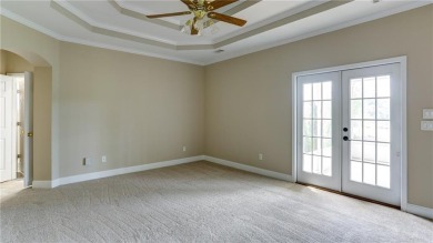 Charming ranch home with stunning golf course views! This on Hampton Golf Village in Georgia - for sale on GolfHomes.com, golf home, golf lot