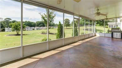 Charming ranch home with stunning golf course views! This on Hampton Golf Village in Georgia - for sale on GolfHomes.com, golf home, golf lot
