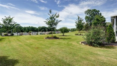 Charming ranch home with stunning golf course views! This on Hampton Golf Village in Georgia - for sale on GolfHomes.com, golf home, golf lot