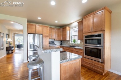 Welcome to this stunning ranch-style home with a fully finished on  in Colorado - for sale on GolfHomes.com, golf home, golf lot