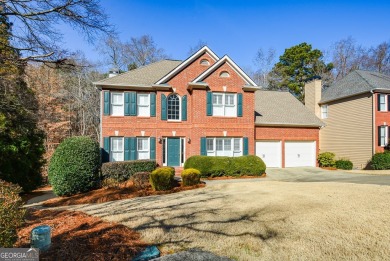 Welcome home! This beautifully updated and maintained brick home on Towne Lake Hills Golf Club in Georgia - for sale on GolfHomes.com, golf home, golf lot