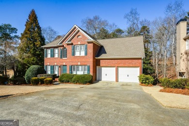 Welcome home! This beautifully updated and maintained brick home on Towne Lake Hills Golf Club in Georgia - for sale on GolfHomes.com, golf home, golf lot