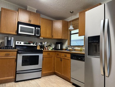 Price Reduction - Discover your ideal Florida retreat in the on Spanish Lakes Fairways in Florida - for sale on GolfHomes.com, golf home, golf lot