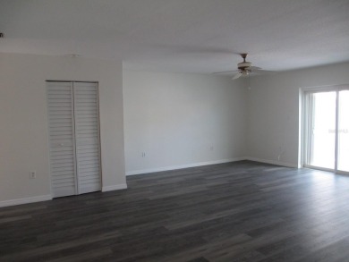 Under contract-accepting backup offers. Room to Roam in this on The Dunedin Country Club in Florida - for sale on GolfHomes.com, golf home, golf lot