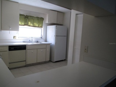 Under contract-accepting backup offers. Room to Roam in this on The Dunedin Country Club in Florida - for sale on GolfHomes.com, golf home, golf lot
