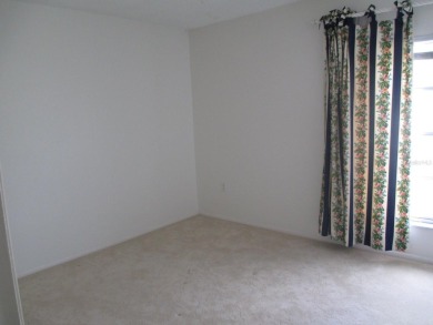 Under contract-accepting backup offers. Room to Roam in this on The Dunedin Country Club in Florida - for sale on GolfHomes.com, golf home, golf lot