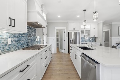 Set within the gated elegance of Pawleys Plantation Golf & on Pawleys Plantation Golf and Country Club in South Carolina - for sale on GolfHomes.com, golf home, golf lot