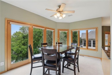 Perched at the top of a hill, this Victoria home offers peaceful on Deer Run Golf Club in Minnesota - for sale on GolfHomes.com, golf home, golf lot