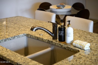 Welcome to this furnished 2-bedroom, 2-bathroom condo perched on on Headwaters Golf Course At Granby Ranch in Colorado - for sale on GolfHomes.com, golf home, golf lot