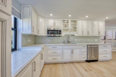 Beautifully remodeled spacious open floor plan located on the on Quail Ridge Golf Course and Country Club in Florida - for sale on GolfHomes.com, golf home, golf lot