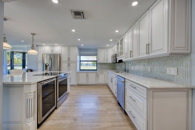Beautifully remodeled spacious open floor plan located on the on Quail Ridge Golf Course and Country Club in Florida - for sale on GolfHomes.com, golf home, golf lot