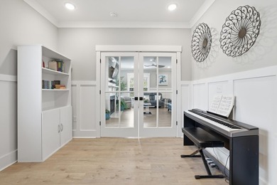 Set within the gated elegance of Pawleys Plantation Golf & on Pawleys Plantation Golf and Country Club in South Carolina - for sale on GolfHomes.com, golf home, golf lot