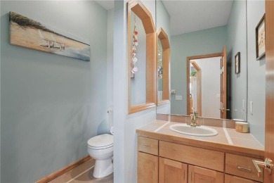 Perched at the top of a hill, this Victoria home offers peaceful on Deer Run Golf Club in Minnesota - for sale on GolfHomes.com, golf home, golf lot