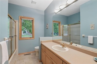 Perched at the top of a hill, this Victoria home offers peaceful on Deer Run Golf Club in Minnesota - for sale on GolfHomes.com, golf home, golf lot