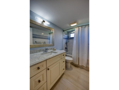Beautifully remodeled spacious open floor plan located on the on Quail Ridge Golf Course and Country Club in Florida - for sale on GolfHomes.com, golf home, golf lot