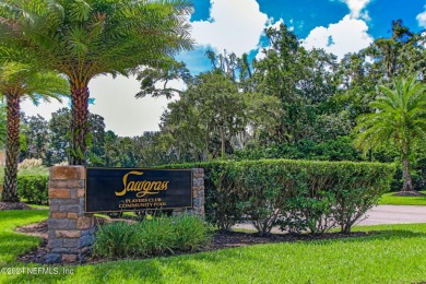 Behind the gates of TPC Sawgrass, home of the Players on TPC at Sawgrass in Florida - for sale on GolfHomes.com, golf home, golf lot