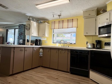 Welcome to your slice of paradise in the vibrant, 55+ Spanish on Spanish Lakes Fairways in Florida - for sale on GolfHomes.com, golf home, golf lot