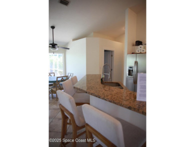 Beautifully maintained 3-bedroom, 2-bathroom pool home located on Suntree Country Club in Florida - for sale on GolfHomes.com, golf home, golf lot