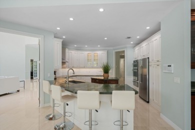 Located in  Palm Beach Polo community, this stunning 4-bedroom on Palm Beach Polo and Country Club in Florida - for sale on GolfHomes.com, golf home, golf lot