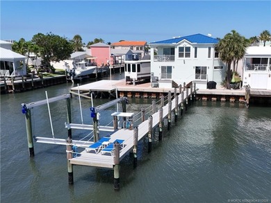 Waterfront living at its best! This fully furnished 2BD on Island Dunes Country Club in Florida - for sale on GolfHomes.com, golf home, golf lot