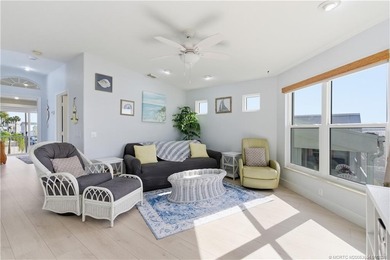 Waterfront living at its best! This fully furnished 2BD on Island Dunes Country Club in Florida - for sale on GolfHomes.com, golf home, golf lot