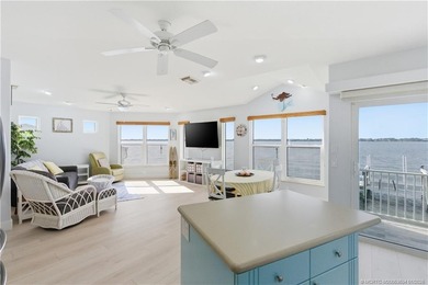 Waterfront living at its best! This fully furnished 2BD on Island Dunes Country Club in Florida - for sale on GolfHomes.com, golf home, golf lot