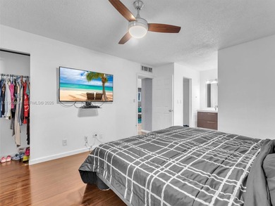 Experience elevated living in this beautifully 2-bedroom, 2-bath on Inverrary Country Club in Florida - for sale on GolfHomes.com, golf home, golf lot