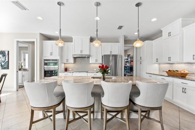 Live the Florida Dream! This stunning custom-built waterfront on Rotonda Golf and Country Club - Long Marsh  in Florida - for sale on GolfHomes.com, golf home, golf lot