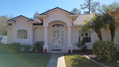 Welcome to 114 Foxhall Lane, where relaxed coastal living meets on Palm Harbor Golf Club in Florida - for sale on GolfHomes.com, golf home, golf lot