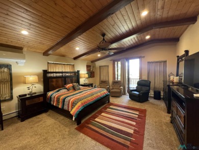 Wake up to fresh mountain air, peaceful pines, and the beauty of on Pendaries Village Community Assoc. in New Mexico - for sale on GolfHomes.com, golf home, golf lot