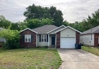 With a  little elbow grease and TLC you can bring this property on Schifferdecker Golf Course in Missouri - for sale on GolfHomes.com, golf home, golf lot