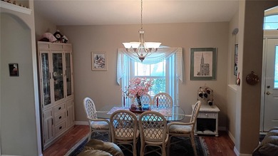 Welcome to 114 Foxhall Lane, where relaxed coastal living meets on Palm Harbor Golf Club in Florida - for sale on GolfHomes.com, golf home, golf lot