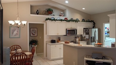 Welcome to 114 Foxhall Lane, where relaxed coastal living meets on Palm Harbor Golf Club in Florida - for sale on GolfHomes.com, golf home, golf lot