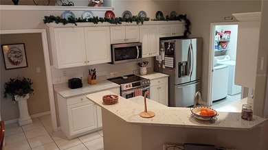 Welcome to 114 Foxhall Lane, where relaxed coastal living meets on Palm Harbor Golf Club in Florida - for sale on GolfHomes.com, golf home, golf lot