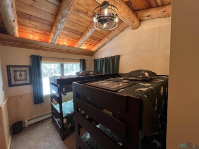 Wake up to fresh mountain air, peaceful pines, and the beauty of on Pendaries Village Community Assoc. in New Mexico - for sale on GolfHomes.com, golf home, golf lot